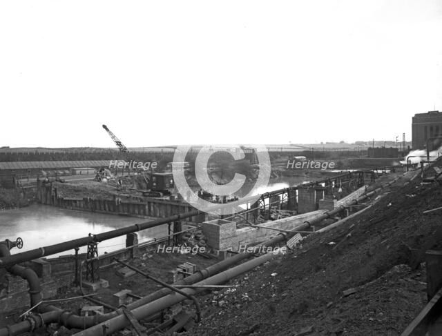 Construction of the reservoir, Manvers Main Colliery, Wath upon Dearne, South Yorkshire, 1955. Artist: Michael Walters