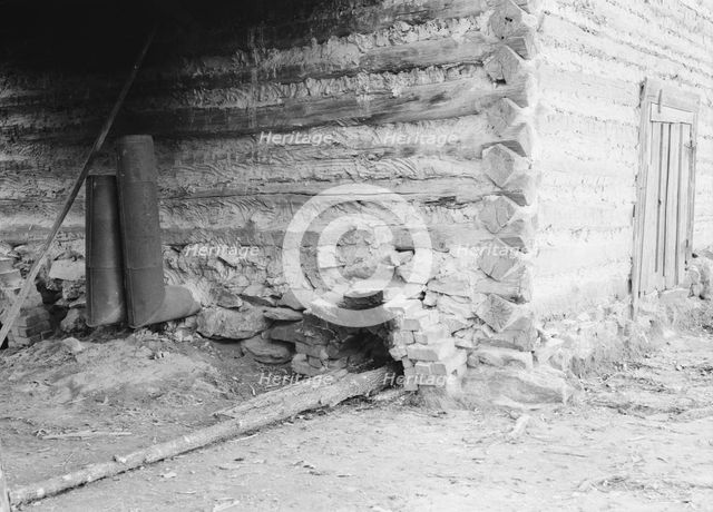 Construction detail of tobacco barn showing method of firing, 1939. Creator: Dorothea Lange.