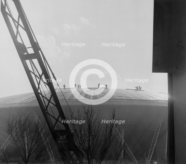Construction workers on the roof of the Dome of Discovery, Festival of Britain, London, 1951. Artist: Henry Grant