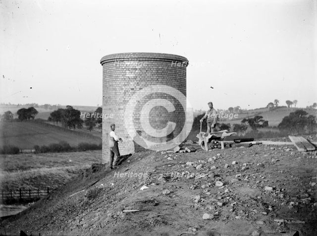 Construction workers near a ventilation chimney at Charwelton, Northamptonshire, c1873-c1923. Artist: Alfred Newton & Sons