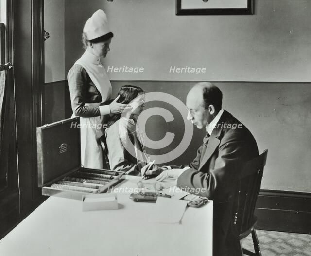 Consulting Room, Norwood School treatment centre, London, 1911. Artist: Unknown.
