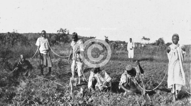 Conquest of German East Africa; Pleasures of the German regime: chained native..., 1917. Creator: Unknown.