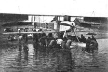 Conquest of GermanEast Africa; Launching a seaplane on Tanganyika with the help of..., 1917. Creator: Unknown