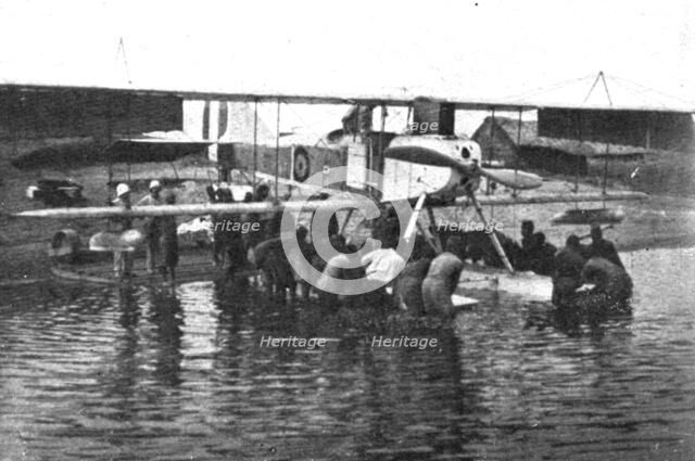 Conquest of GermanEast Africa; Launching a seaplane on Tanganyika with the help of..., 1917. Creator: Unknown.