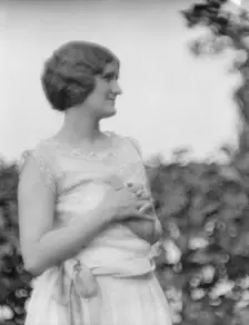 Conroy, Frank, Mrs., standing outdoors, 1923 Creator: Arnold Genthe