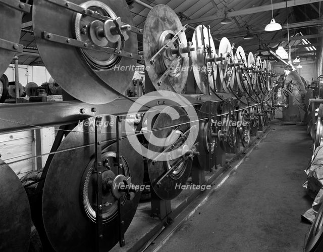 Continuous bandsaw blades, Slack Sellers & Co Ltd, Sheffield, South Yorkshire, 1963. Creator: Michael Walters.
