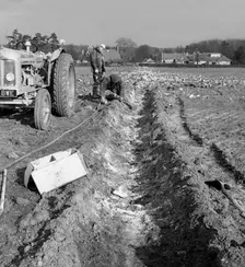 Contractors setting explosives in a trench in Firbeck, near Rotherham, 1962. Creator: Michael Walters