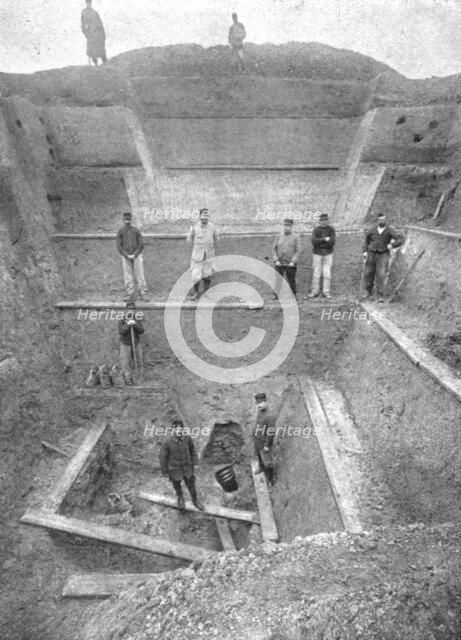 'Contre des villes Ouvertes; Les fouilles, pour retrouver la projectile', 1916. Creator: Unknown.