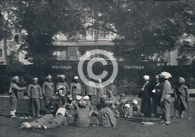 'Convalescent Indian Soldiers Playing Quoits on the Eastern Lawns', c1915, (1939). Artist: Unknown.
