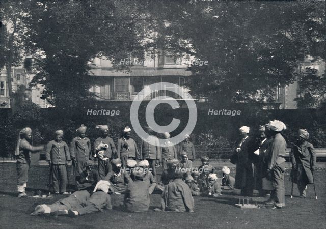 'Convalescent Indian Soldiers Playing Quoits on the Eastern Lawns', c1915, (1939). Artist: Unknown.