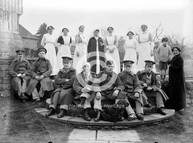 Convalescent soldiers and nursing staff, Nathaniel Lloyd's house, Great Dixter, East Sussex, 1916. Artist: Nathaniel Lloyd