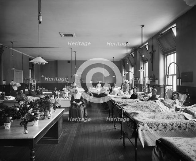 Convalescing soldiers at the Italian Hospital, Queen Square, Camden, London, January 1918. Artist: H Bedford Lemere.