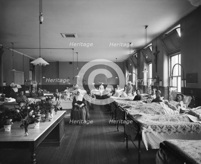 Convalescing soldiers at the Italian Hospital, Queen Square, Camden, London, January 1918. Artist: H Bedford Lemere.