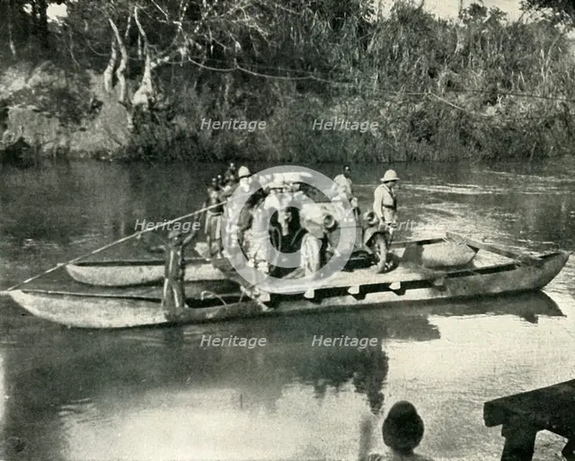 'Conveying Motor Transport across the Mbaka River, German East Africa', (1919).  Creator: Unknown.