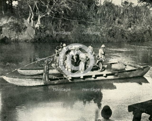 'Conveying Motor Transport across the Mbaka River, German East Africa', (1919).  Creator: Unknown.
