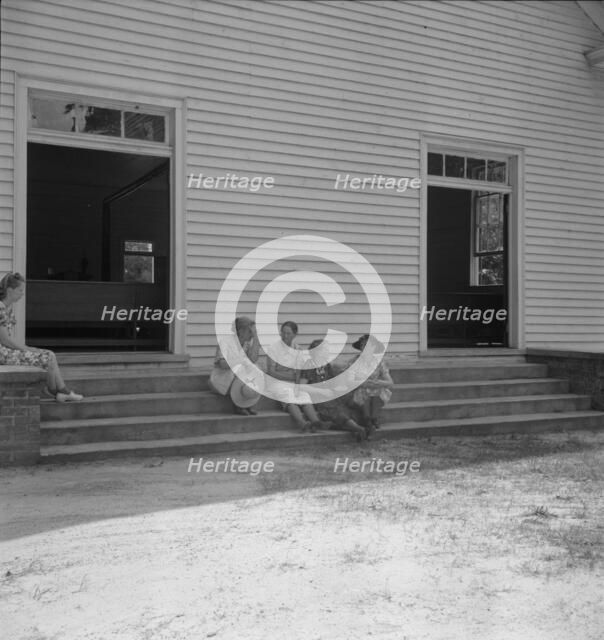 Conversation among members of congregation, Wheeley's Church, Gordonton, N Carolina, 1939. Creator: Dorothea Lange.