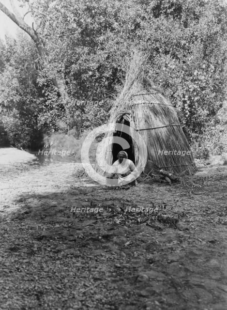 Cooking acorns-upper Lake Pomo, c1924. Creator: Edward Sheriff Curtis.