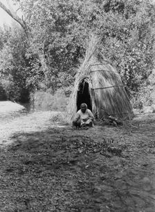 Cooking acorns-upper Lake Pomo, c1924. Creator: Edward Sheriff Curtis