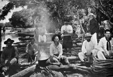 Cooking on a raft, Paraguay, 1911