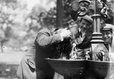 Cooling his head - N.Y. on hot day, between c1910 and c1915. Creator: Bain News Service