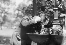 Cooling his head - N.Y. on hot day, between c1910 and c1915. Creator: Bain News Service