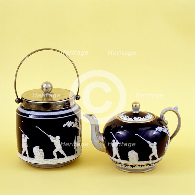Copeland Spode biscuit barrel and teapot decorated with images of golfers, c1905. Artist: Copeland Spode