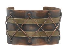 Copper and brass diamond design cuff by Winifred Mason Chenet, ca. 1945. Creator: Winifred Mason Chenet