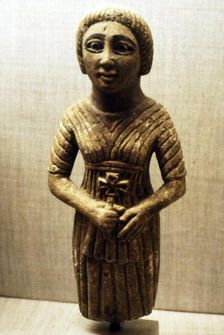 Coptic figure of woman clasping a crucifix, Sheik Ibada, Upper Egypt, 350-400