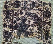 Coptic Textie of a panther attacking a man, 6th century