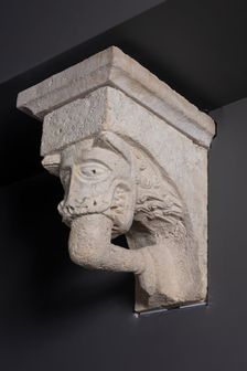Corbel with Animal Mask with Teeth Fastened on Human Leg from the Monastery Church of... Creator: Unknown