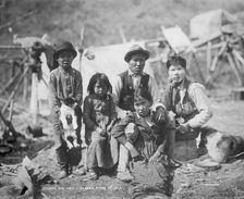 Cordova natives and dogs, between c1906 and 1915. Creator: Eric A. Hegg