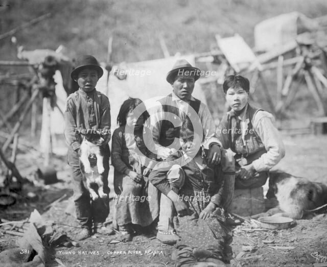 Cordova natives and dogs, between c1906 and 1915. Creator: Eric A. Hegg.