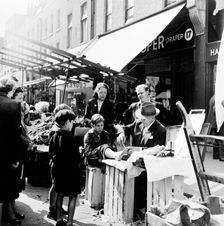 Corn Cure, Chapel Street Market, Islington, London, 1955. Creator: Henry Grant