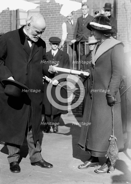 Corn Growers - Secretary Wilson Presenting Diploma To Viola Lewis of Arkansas, 1912. Creator: Harris & Ewing.