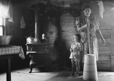 Corner of kitchen, home of tobacco sharecropper, Person County, North Carolina, 1939. Creator: Dorothea Lange