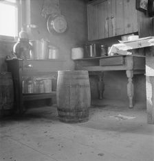 Corner of Roberts one-room basement dugout, Malheur County, Oregon, 1939. Creator: Dorothea Lange