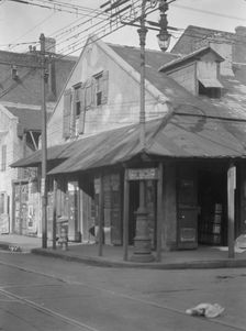 Corner store in the French Quarter, New Orleans, between 1920 and 1926. Creator: Arnold Genthe