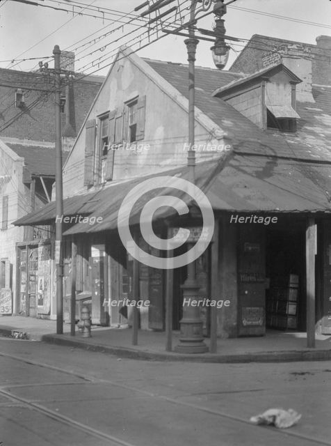 Corner store in the French Quarter, New Orleans, between 1920 and 1926. Creator: Arnold Genthe.