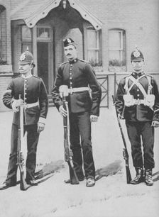 Corporal and Privates, the Buffs c1880. Artist: Gregory & Co