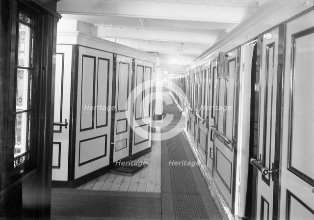 Corridor and cabins on 'SS Insulinde', 1914. Creator: Kirk & Sons of Cowes.
