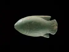 Cosmetic scoop in the shape of a moulded glass fish, XVIIIth Dynasty, c1540-1292BC