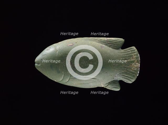 Cosmetic scoop in the shape of a moulded glass fish, XVIIIth Dynasty, c1540-1292BC. Artist: Unknown.