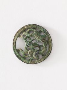 Costume ornament: dragon in roundel (pair with F1917.565), Goryeo period, 12th-13th century. Creator: Unknown