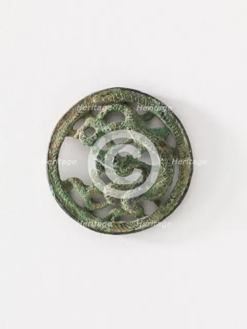 Costume ornament: dragon in roundel (pair with F1917.565), Goryeo period, 12th-13th century. Creator: Unknown.