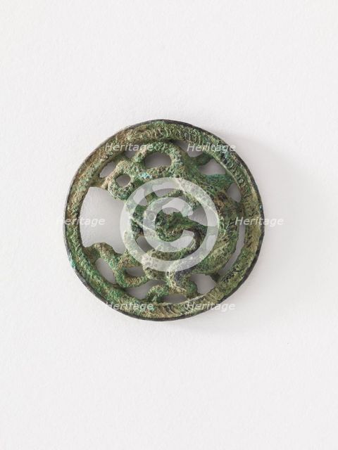 Costume ornament: dragon in roundel (pair with F1917.565), Goryeo period, 12th-13th century. Creator: Unknown.