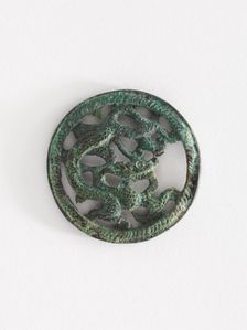 Costume ornament: dragon in roundel (pair with F1917.566), Goryeo period, 12th-13th century. Creator: Unknown