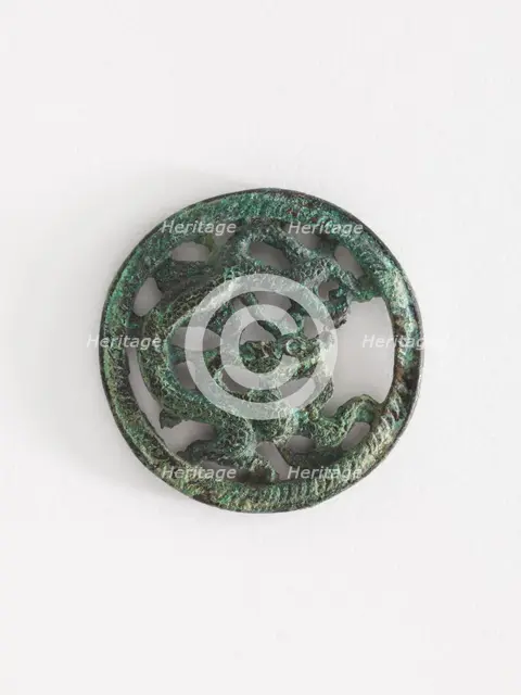 Costume ornament: dragon in roundel (pair with F1917.566), Goryeo period, 12th-13th century. Creator: Unknown.