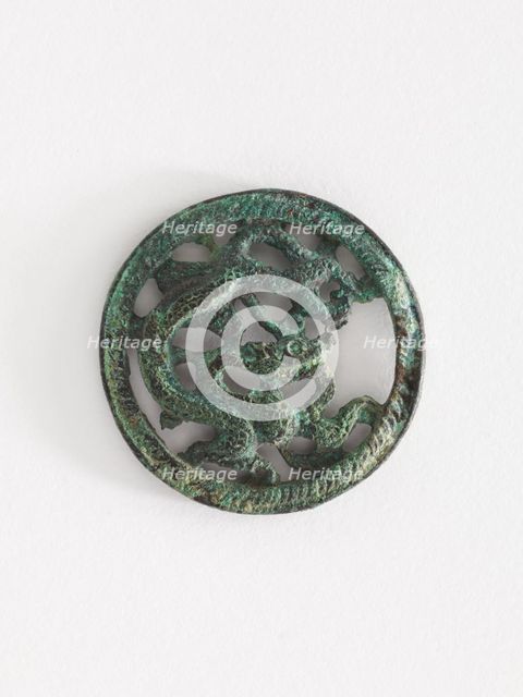 Costume ornament: dragon in roundel (pair with F1917.566), Goryeo period, 12th-13th century. Creator: Unknown.