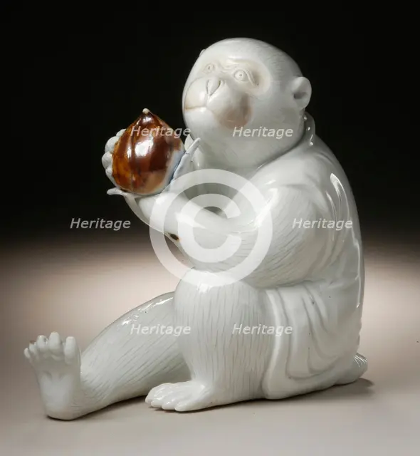 Costumed Monkey Holding a Chestnut, 19th century. Creator: Unknown.