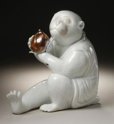 Costumed Monkey Holding a Chestnut, 19th century. Creator: Unknown